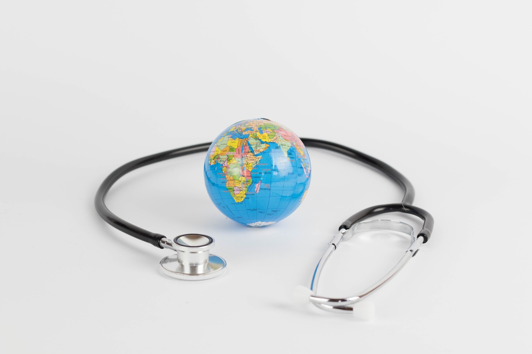 image of a world globe and a stethoscope