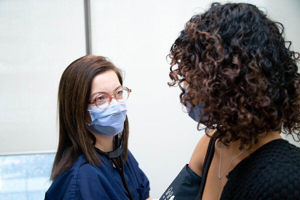 Dr. Danielle Martin in clinic with patient