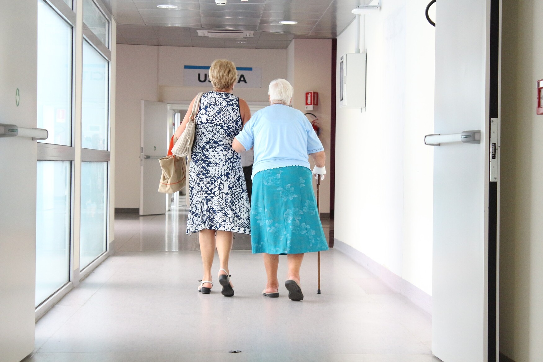 Elderly patient walking in hospital